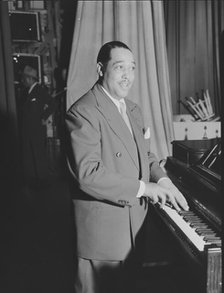 Portrait of Duke Ellington, Howard Theater(?), Washington, D.C., ca. June 1946. Creator: William Paul Gottlieb.