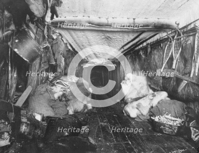 Interior of Eskimo hut, 1916. Creator: Lomen Brothers.