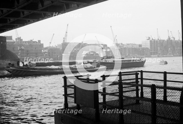Barges on the River Thames, London, c1945-c1965. Artist: SW Rawlings