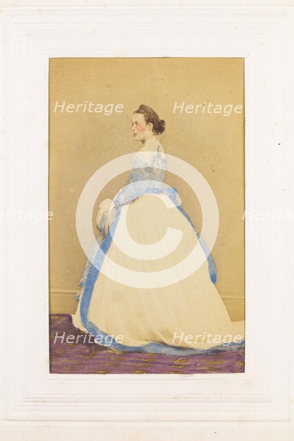 A man in drag standing side-on, [between 1890 and 1899?]. Creator: Unknown.