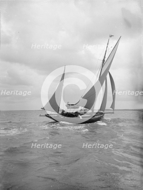 The yawl 'Moosk' under way, 1912. Creator: Kirk & Sons of Cowes.