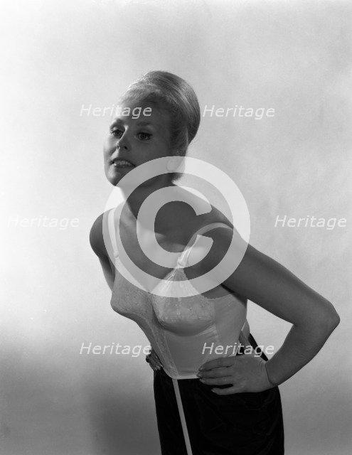 Advertising image for Truline bras, 1963.  Artist: Michael Walters