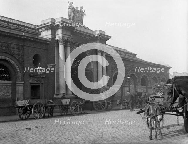 Municipal building and street scene - possibly Ireland, c1890s. Creator: Robert Augustus Henry L'Estrange.