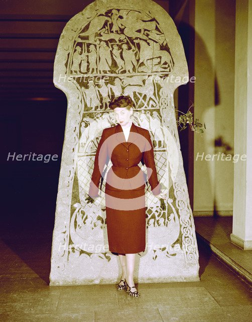 Female model shows a suit, the Historical Museum, Stockholm, 1950s. Artist: Göran Algård