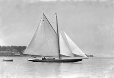 The cutter 'Eve' under sail, 1911. Creator: Kirk & Sons of Cowes.