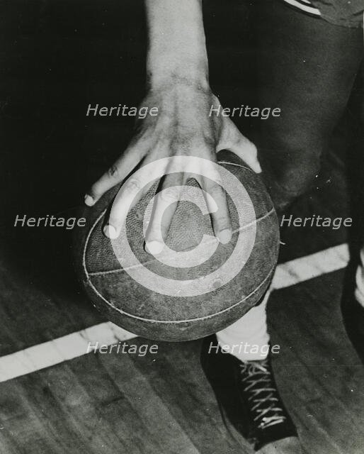 Huge hand span makes ball handling easy, 1947. Creator: Unknown.