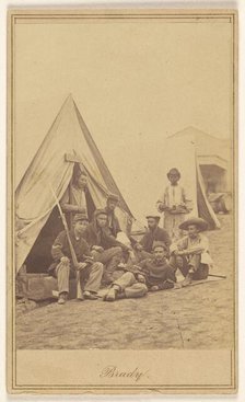 Group of seven soldiers and one black servant at a campsite, about 1862. Creator: Mathew Brady.