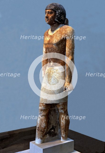 Funerary statue of Nenkheftka, made in polychromed limestone.