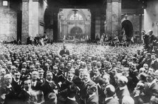 Crowd on stock exchange floor, London, between 1910-1920. Creator: Bain News Service.