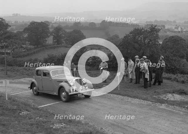 Rover saloon of WJH Davies competing in the South Wales Auto Club Welsh Rally, 1937 Artist: Bill Brunell.