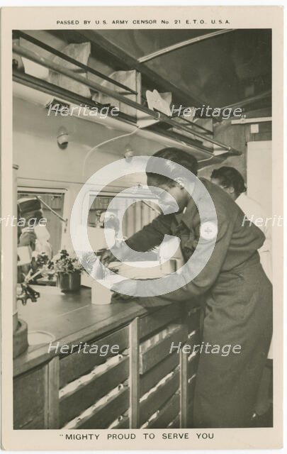 Picture postcard of a volunteer serving troops out of a Red Cross “Clubmobile", ca. 1945. Creator: Unknown.