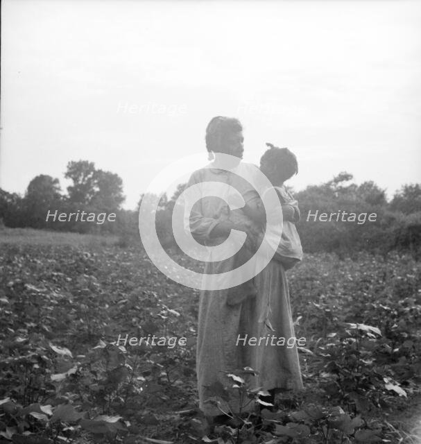 Old time Mississippi Negro living on a cotton patch near Vicksburg, Mississippi, 1936. Creator: Dorothea Lange.