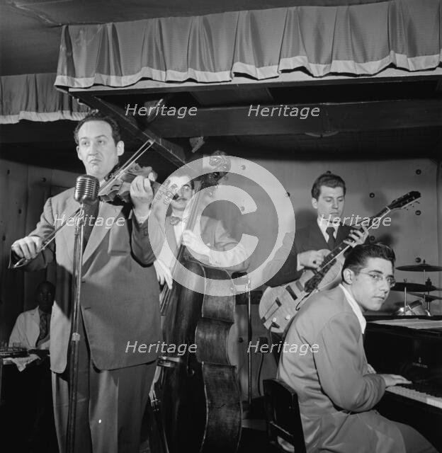 Portrait of Sam Hall Kaplan, Frenchy Cauette, Chuck Wayne, and Deryk Sampson, Three Deuces, NY, 1947 Creator: William Paul Gottlieb.