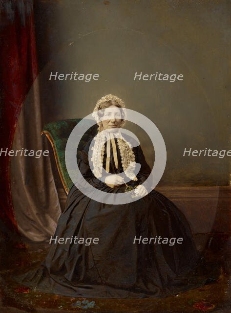 Seated woman in bonnet, about 1850. Creator: Unknown.