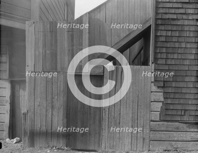 Mission District firetrap, San Francisco, California, 1936. Creator: Dorothea Lange.