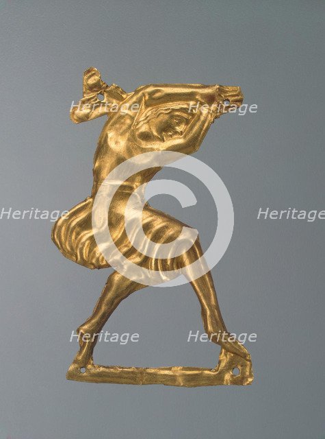 Gold plaque in the form of a dancing woman, 330-300 BC. Artist: Ancient jewelry  