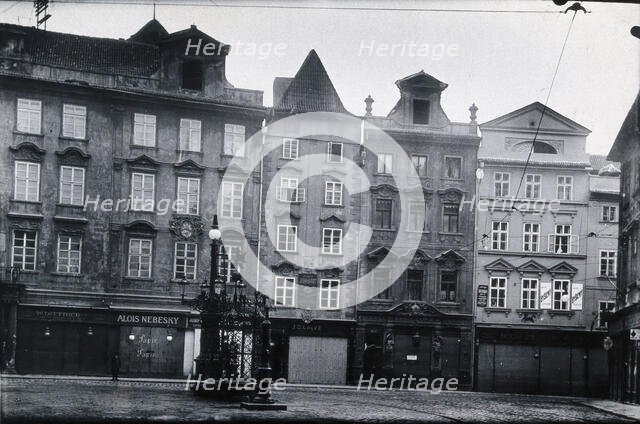 The front of a pharmacy in a cobbled square in Prague, c1890s. Creator: Zikmund Reach.