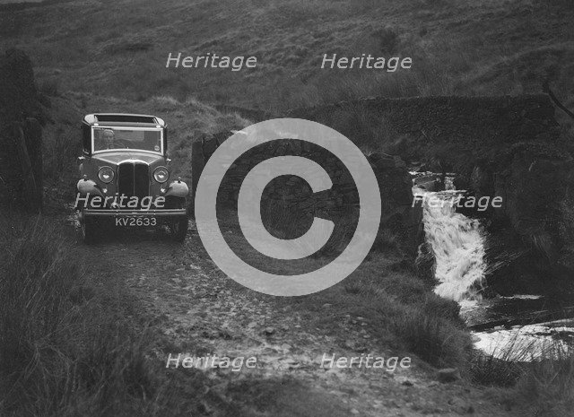 Kitty Brunell road testing a Standard Little Twelve saloon, c1932. Artist: Bill Brunell.