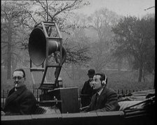 A Car on the Road Equipped with a Radio, an Aerial, and Speakers, 1922. Creator: British Pathe Ltd.
