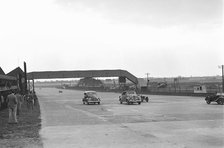 Two Ford V8s and a MG PB at the MCC Members Day, Brooklands, 1938 or 1939. Artist: Bill Brunell.