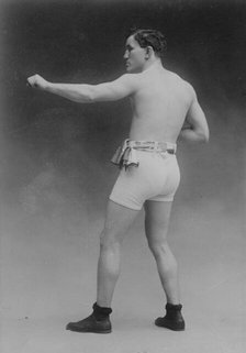 Tommy Murphy in athletic trunks, 1910. Creator: Bain News Service.