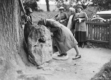 People visiting King Alfred's Blowing Stone, Kingston Lisle, near Uffington, Oxfordshire, c1920s. Artist: Bill Brunell.