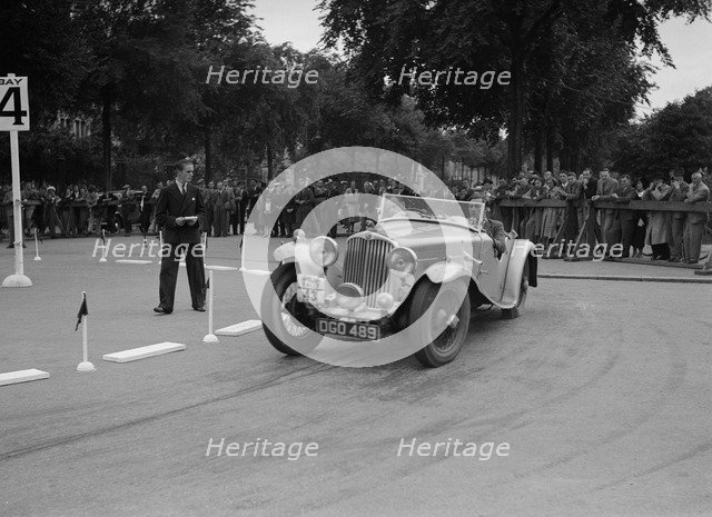 AC of LP Jaques competing in the South Wales Auto Club Welsh Rally, 1937 Artist: Bill Brunell.