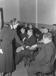 Meeting opens with taking the collection, Salvation Army, San Francisco, California, 1939. Creator: Dorothea Lange.