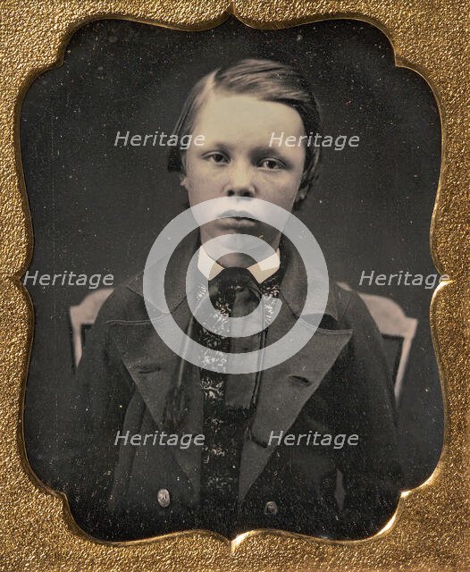 Boy in Wide Lapelled Coat, Seated in Chair, 1850s. Creator: Unknown.