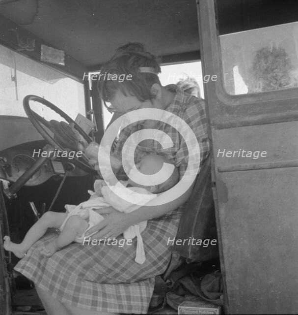 Wife and sick child of tubercular itinerant, stranded in New Mexico, 1936. Creator: Dorothea Lange.