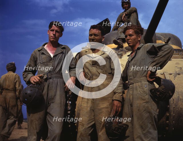 Tank crew standing in front of M-4 tank, Ft. Knox, Ky., 1942. Creator: Alfred T Palmer.