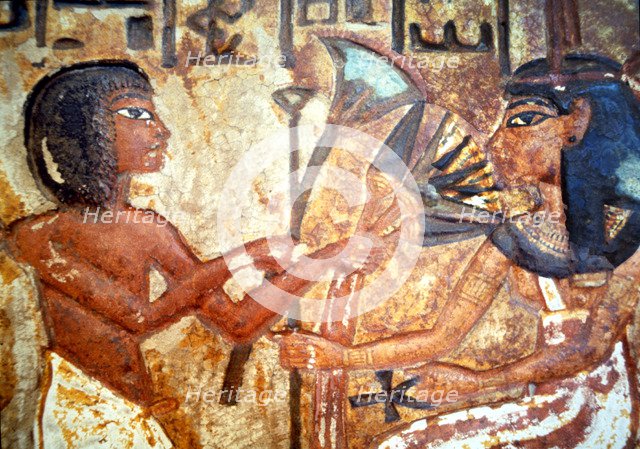 Detail of a familiar stele in a worship chapel.