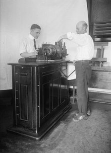 Census Bureau, Department of Commerce - Tabulating Machine, 1917. Creator: Harris & Ewing.