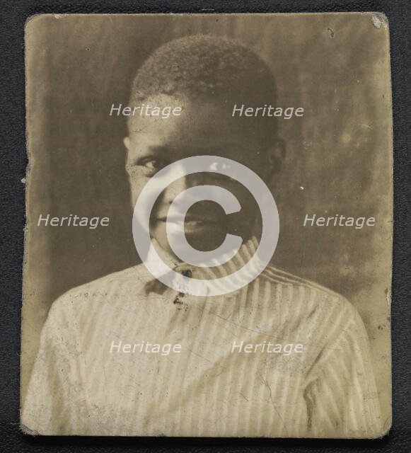 Photographic print of a young boy, early 20th century. Creator: Unknown.