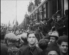 Italian Soldiers Standing on or Near a Train, 1922. Creator: British Pathe Ltd.