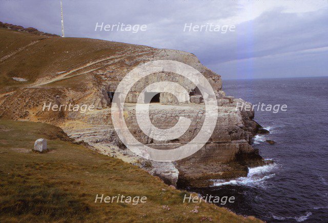 Tilly Whim Caves on Durlston Head, Dorset, 20th century.  Artist: CM Dixon.