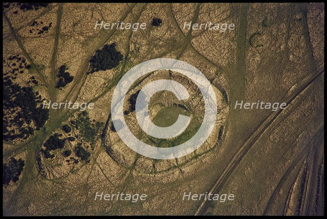 The Ring oval enclosure earthwork on Cleeve Common, Cleeve Hill, Gloucestershire, 1971. Creator: Jim Hancock.