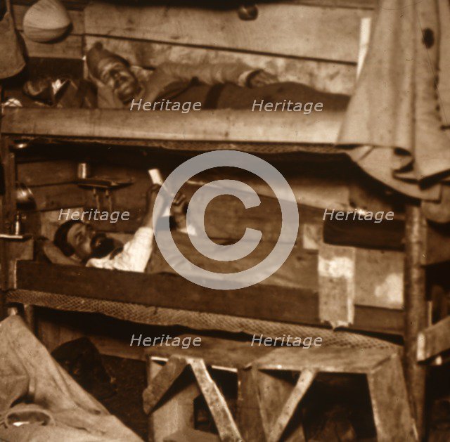 Soldiers in wooden bunks, c1914-c1918. Artist: Unknown.
