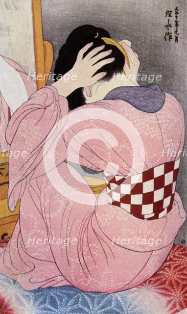 A Japanese woman dressing her hair, 1920s (1930).Artist: Hashiguchi Goyo