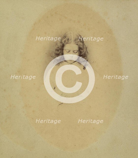 Edith Liddell Seated Beside a Vase of Foxgloves, 1860. Creator: Lewis Carroll.