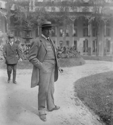 Wm. Barnes, Jr., standing outside in park, 1910. Creator: Bain News Service.