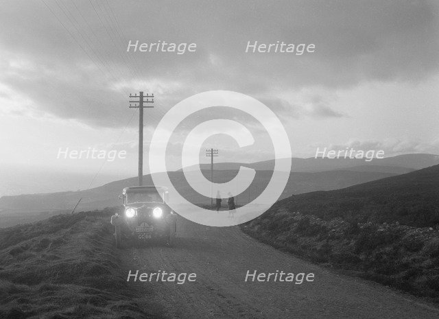 Talbot 14/45 4-door saloon of Kitty Brunell competing in the Monte Carlo Rally, Monaco, 1930. Artist: Bill Brunell.