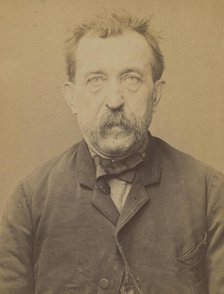 Gelhausen. Jean. 55 ans, né à Grevennemache (Luxembourg). Cordonnier. Infraction à la loi ..., 1893. Creator: Alphonse Bertillon.