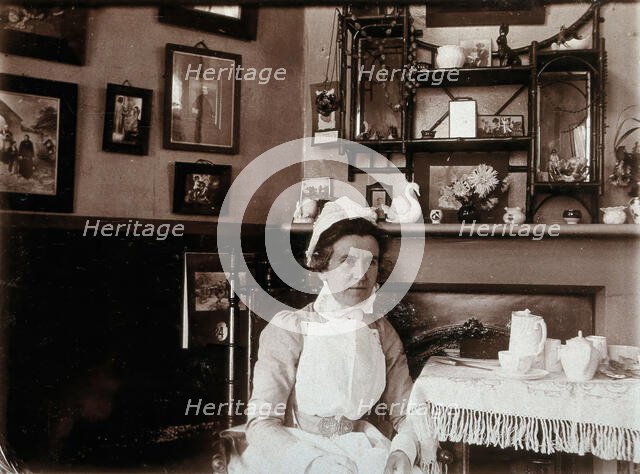 St Bartholomew's Hospital, London: a nurse taking tea, c1890. Creator: Unknown.