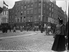 Racine Watch and clock makers building established 1833 (Ireland), 1895. Creator: Robert Augustus Henry L'Estrange.