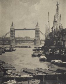The pool and Tower Bridge. From the album: Photograph album - London, 1920s. Creator: Harry Moult.