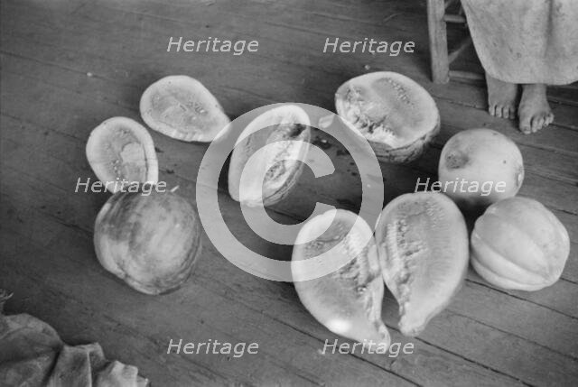 Melons on Frank Tengle's porch. Hale County, Alabama, 1936. Creator: Walker Evans.