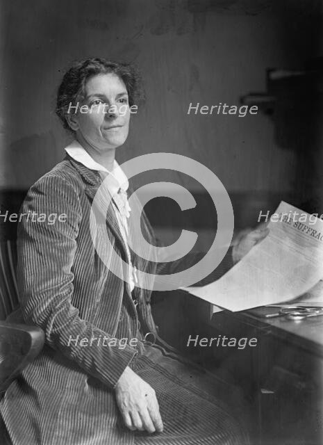Mrs. Rheta C. Dorr, Suffragist, with First Edition of 'The Suffragist', 1913. Creator: Harris & Ewing.