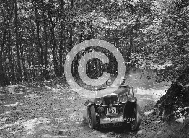 MG J2 competing in the B&HMC Brighton-Beer Trial, Fingle Bridge Hill, Devon, 1934. Artist: Bill Brunell.