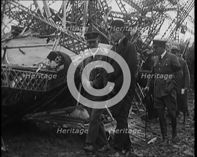Chief Marshal Sir John Salmond and Other British Officials Walking Around the Wreckage..., 1930. Creator: British Pathe Ltd.